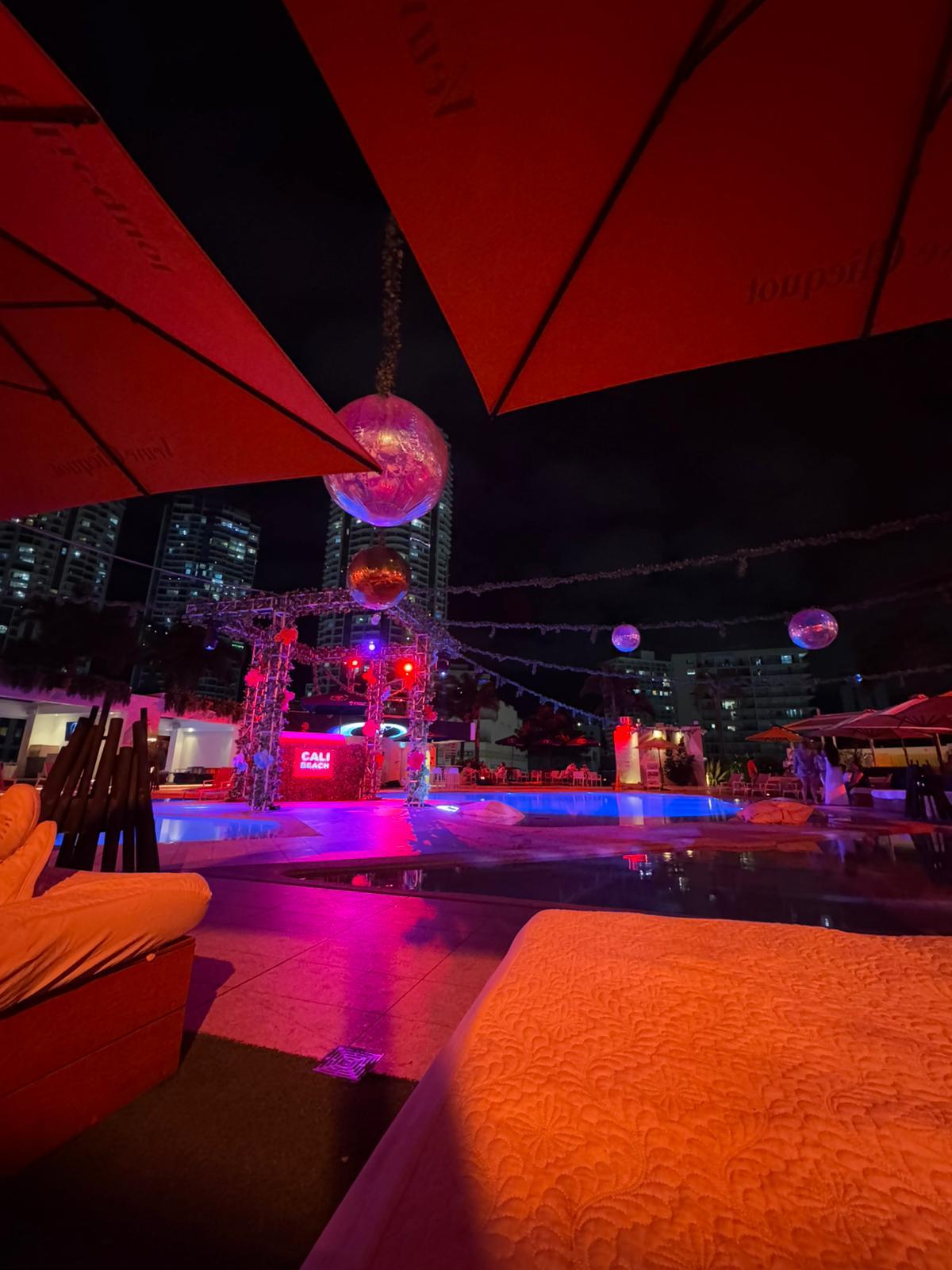 Guests at an Ivy rooftop party event